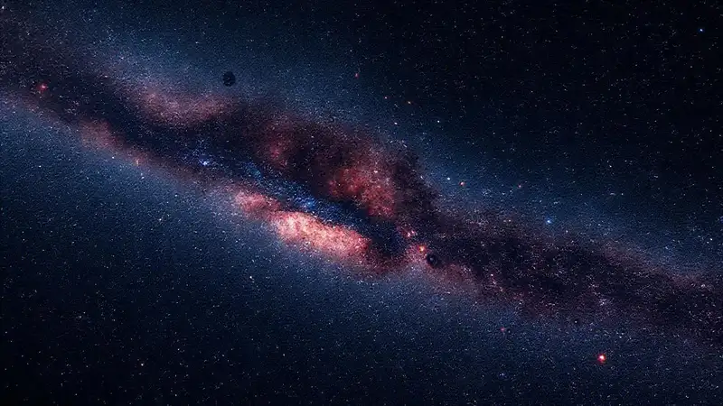 Galaxia, materia oscura y partículas cósmicas